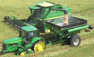 The Efficient Harvesting of Grain - American farm equipment at work